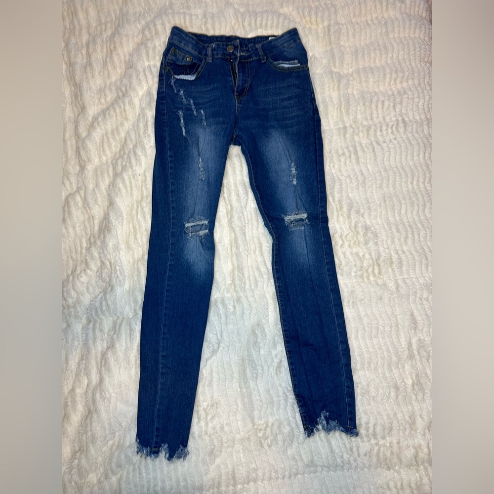 Ripped blue jeans